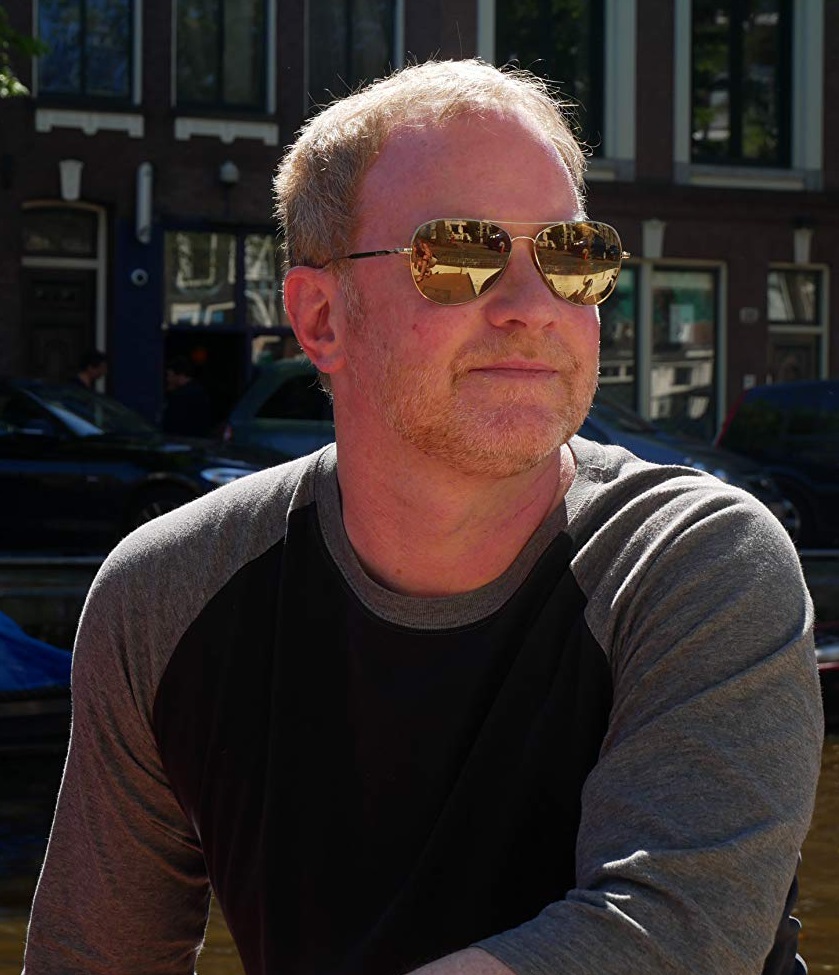 Photo of Craig Titley wearing mirrored sunglasses